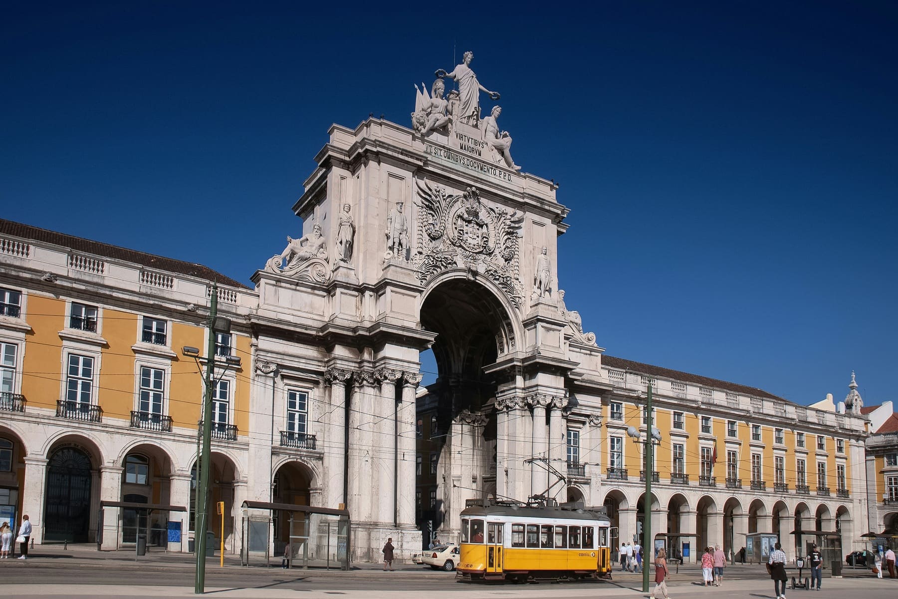 Lisbon cityscape with a historic tram and institutional architecture